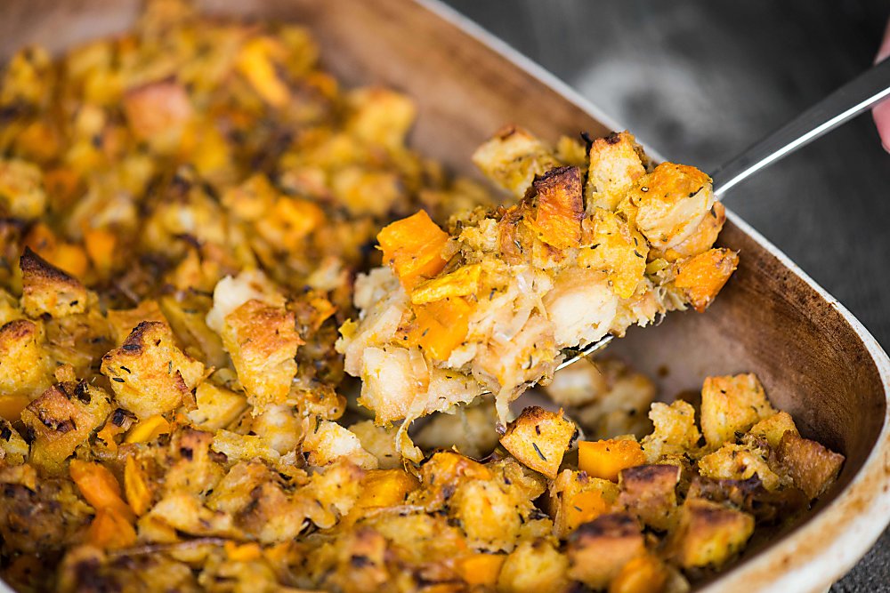 casserole dish with butternut squash leek stuffing.