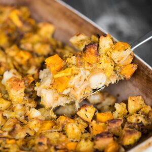casserole dish with butternut squash leek stuffing.